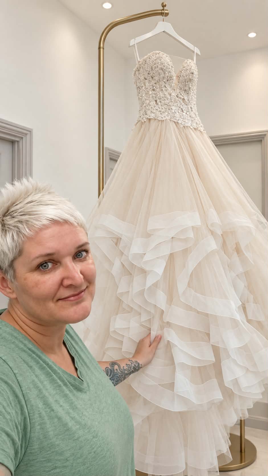Dressmaker with finished bridal gown